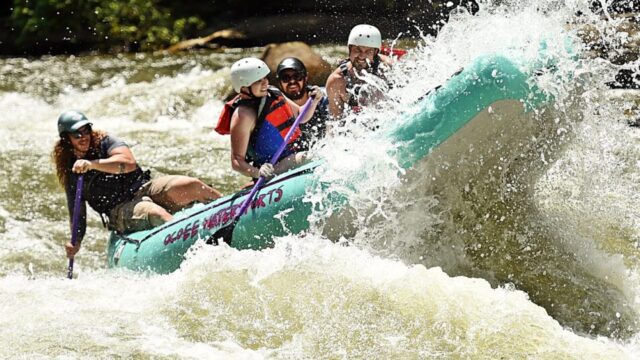 Rafters hitting a rapid on the Ocoee River.