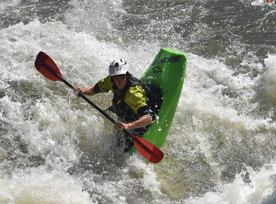 Chris Storgion Kayaking in a playboat on the Ocoee River.