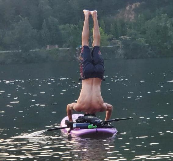 Headstand on a Paddle Board lake ocoee