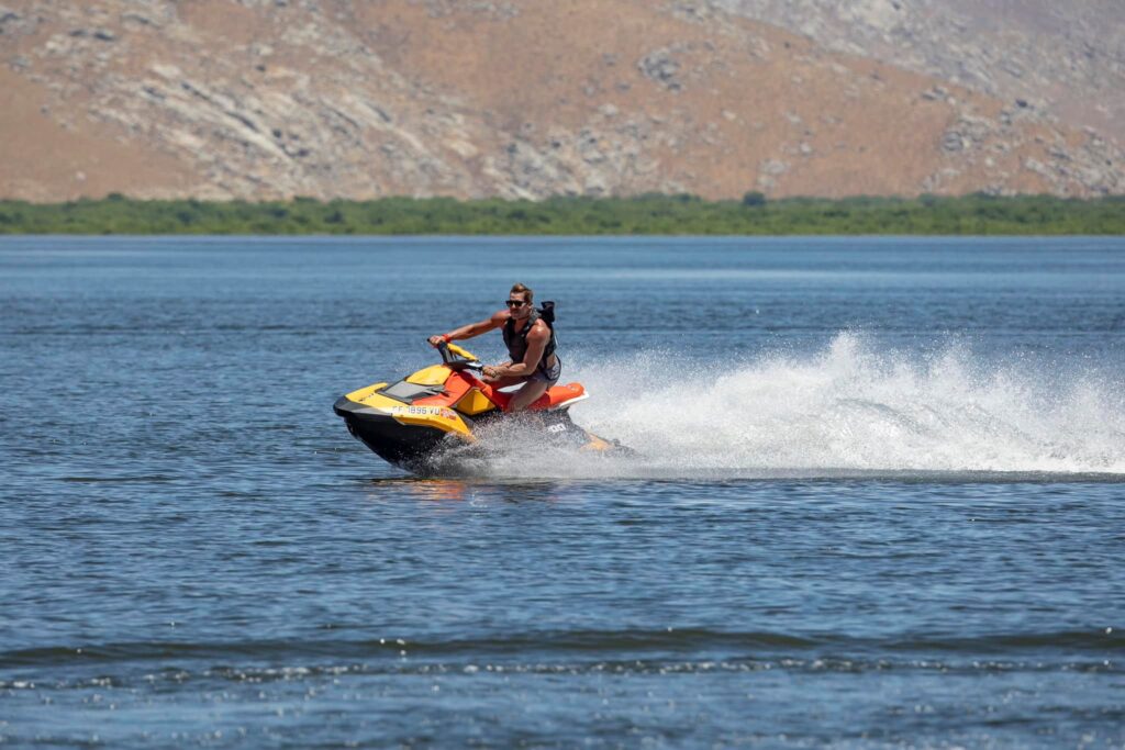 A jet ski leaves a wake on Lake Isabella.