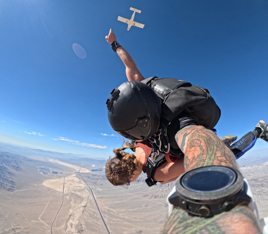 A girl tandem Skydiving