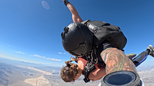 A girl tandem Skydiving