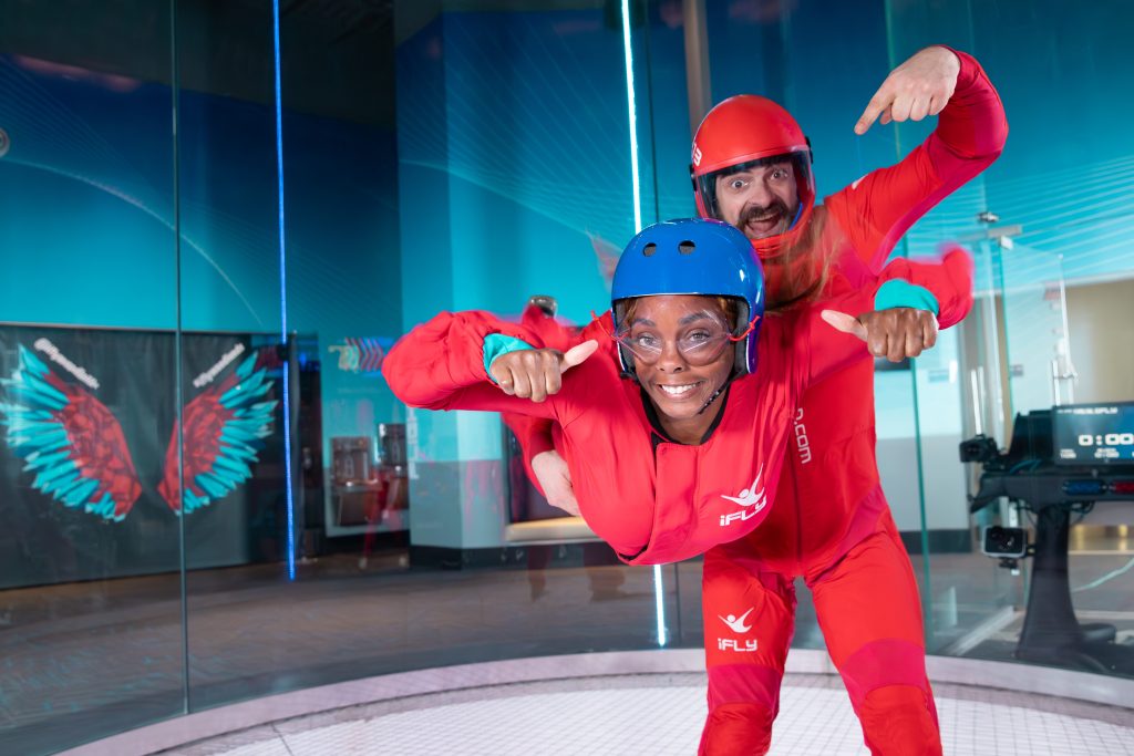 A girl flying in the iFLY tunnel