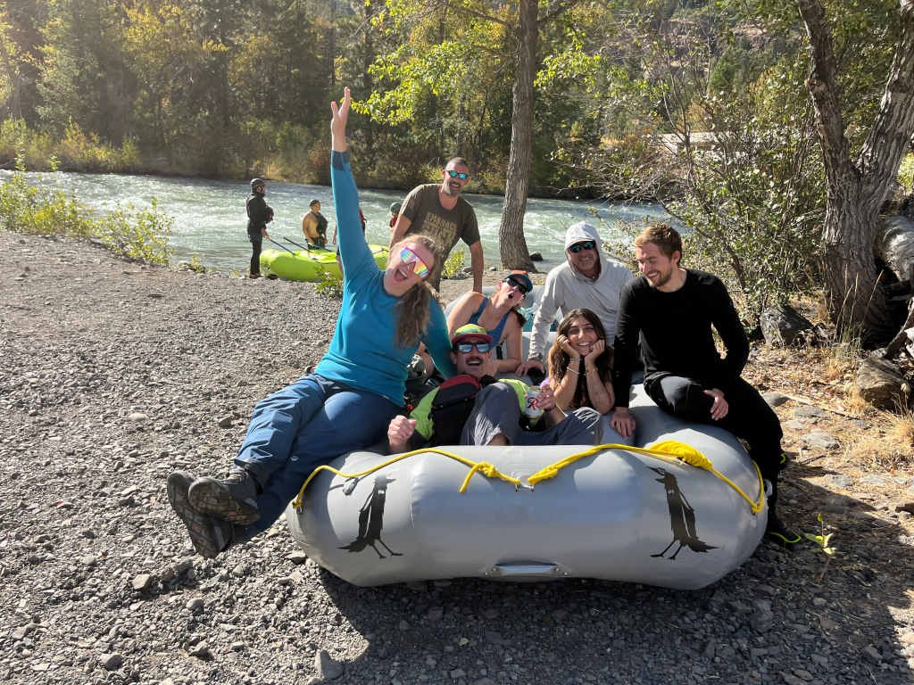 People on a grey raft having fun and about to go on the white salmon river!