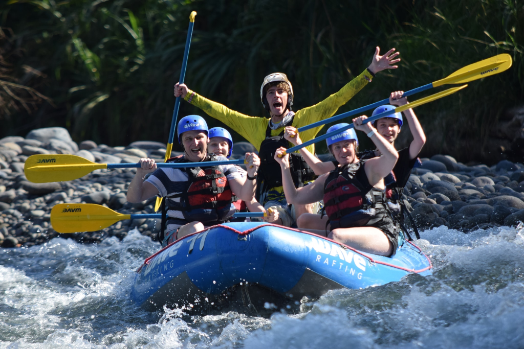 People rafting and having a great time.