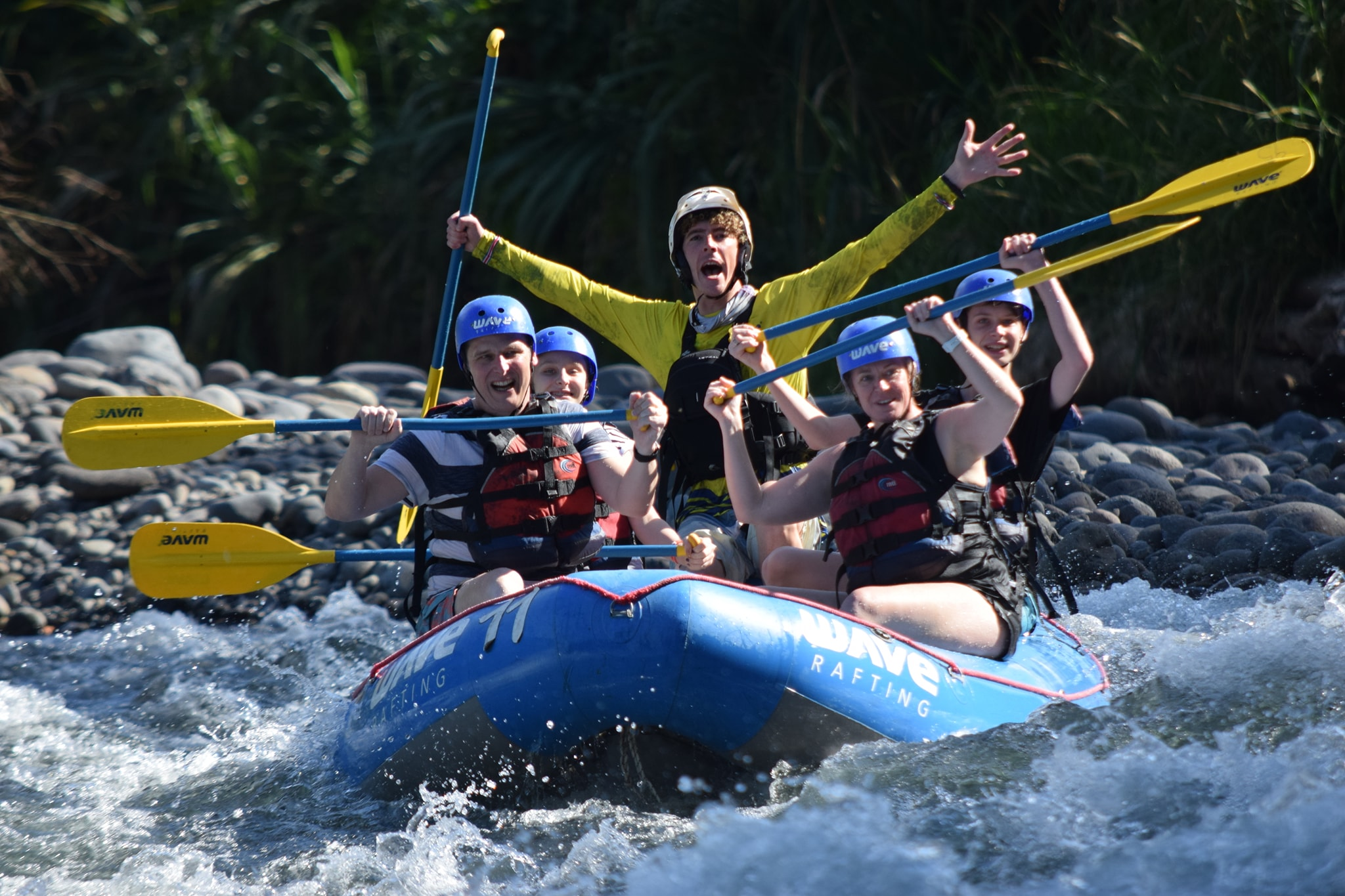People rafting and having a great time.