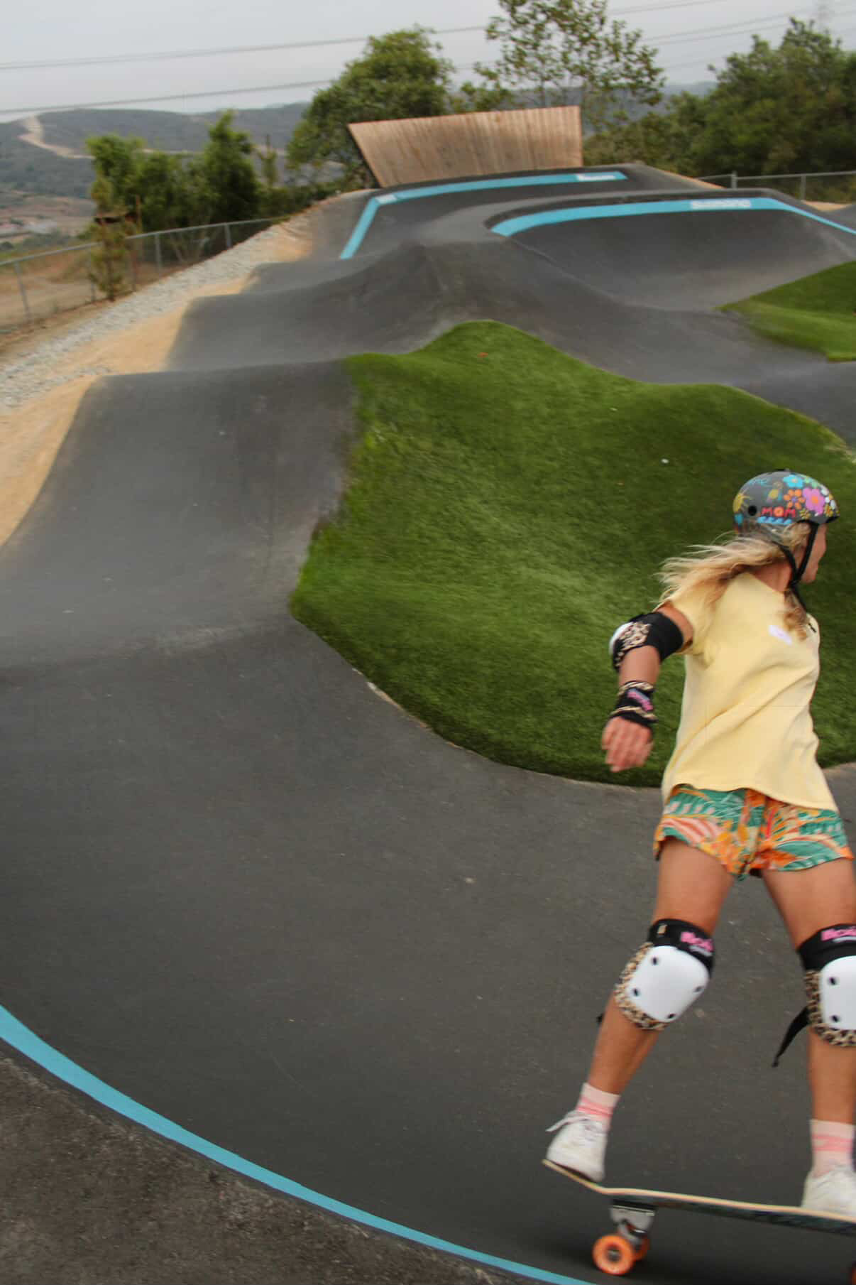 Girl skating in a skate park in california.