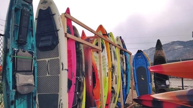 A row of kayaks.