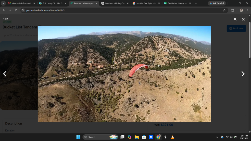 A paraglider in the mountains.
