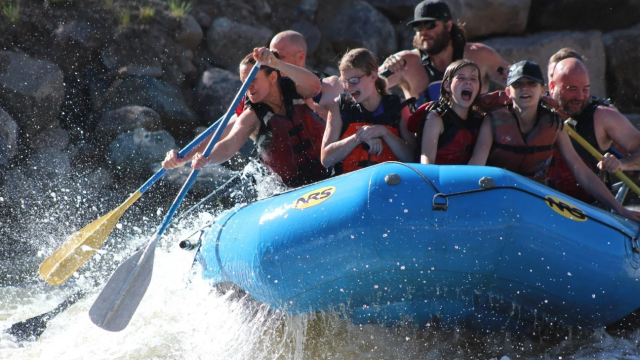 A family whitewater rafting.